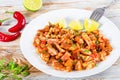 Braised Pig Ears with spices, chili pepper, pieces of lime Royalty Free Stock Photo