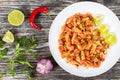 Braised Pig Ears with spices, chili pepper, pieces of lime Royalty Free Stock Photo