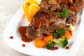 Braised rabbit meat with vegetables and potato dumplings Royalty Free Stock Photo