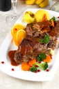 Braised rabbit meat with vegetables and potato dumplings Royalty Free Stock Photo