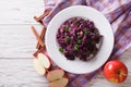 Braised red cabbage with ingredients on the table. Horizontal to Royalty Free Stock Photo