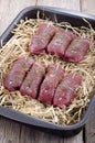 Braising steak on a straw bed Royalty Free Stock Photo