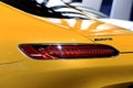 Brake light of yellow Mercedes Benz sport car