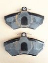 Brake pads black, already used, side view