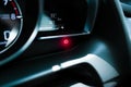 Brake warning light illuminated on instrument panel in a car Royalty Free Stock Photo