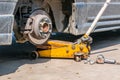 Brakes on a car with removed wheel Royalty Free Stock Photo