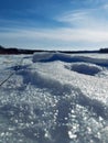 Braking ice on the lake at winter time