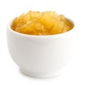 Bramley apple sauce in ceramic bowl on white. Royalty Free Stock Photo
