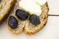 Bran bread and besides black olives, cheese, the most beautiful breakfast cheese and black olives.In different concepts bread, oli Royalty Free Stock Photo