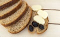 Bran bread and besides black olives, cheese, the most beautiful breakfast cheese and black olives.In different concepts bread, oli Royalty Free Stock Photo