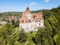 Walled Bran castle on a hill. Dracula's Castle, after Vlad III the Impaler Drakula, Vlad Tepes. Transylvania, Romania.