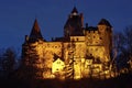 Bran Castle, medieval fortress, lighted at night - landmark attraction in Romania