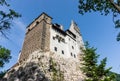 Bran Castle on the stone rock, Romania. Ancient abode of the vampire Dracula Royalty Free Stock Photo