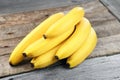 Branch of bananas on the rustic background. Selective focus. Shallow depth of field. Royalty Free Stock Photo
