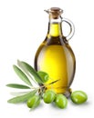 Branch with olives and a bottle of olive oil