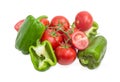 Branch of the ripe red tomatoes and green bell peppers Royalty Free Stock Photo