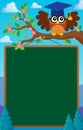 Branch with schoolboard and owl