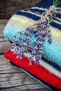 Branches of blooming lavender and wool items Royalty Free Stock Photo