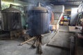 Branches from cajuput tree are placed inside a big pot for cajuput tree extraction