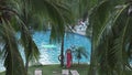 Branches of palm trees on the background of the pool in the Resort Intime Sanya 5 stock footage video