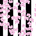 The branches of a beautiful pink orchid on a light background with wide lilac stripes. Seamless pattern.