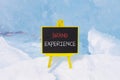 Brand experience symbol. Concept words Brand experience on beautiful yellow black blackboard. Beautiful blue ice background. Royalty Free Stock Photo