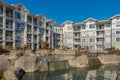 Brand new apartment building on sunny day in BC, Canada. Architectural details of modern apartment building Royalty Free Stock Photo