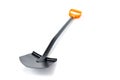 Brand new black metal spade or a shovel isolated over white background. Gardening equipment cut out studio shot.