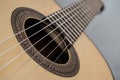 Brand new, brown acoustic guitar with beautiful, colourful decorations