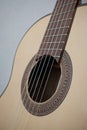 Brand new, brown acoustic guitar with beautiful, colourful decorations