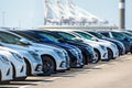 Brand new cars lined up in a parking lot Royalty Free Stock Photo