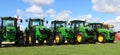 brand new John Deere Tractors on the grass with blue sky Royalty Free Stock Photo