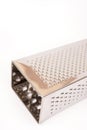 Brand new metal grater on the white background with copy space Royalty Free Stock Photo