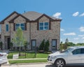 Brand new model house with cars on street near Dallas, Texas Royalty Free Stock Photo