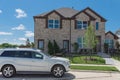 Brand new model house with cars on street near Dallas, Texas Royalty Free Stock Photo