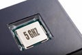 Brand new modern no name silver cpu 5 ghz processor die, chip plastic packed top lid view macro closeup. New tech prop Royalty Free Stock Photo
