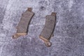 Brand new motorcycle brake pads with ferodo on a gray surface Royalty Free Stock Photo