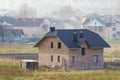 Brand new spacious brick two story residential house with tiling Royalty Free Stock Photo