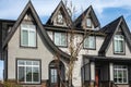 Brand new upscale townhomes in a Canadian neighbourhood. External facade of a row of modern urban townhouses Royalty Free Stock Photo