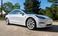 A brand new white Tesla Model 3