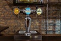 Beer dispenser at the bar Royalty Free Stock Photo