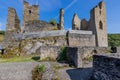 Brandenbourg Castle with its ruined stone brick walls, towers with a blue sky in the background