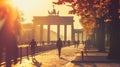 Brandenburg Gate is bathed in the warm glow of an autumn sunrise.