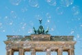 Brandenburg Gate / Brandenburger Tor on sunny day with blue sky and soap bubbles Royalty Free Stock Photo