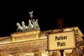 Brandenburg Gate And Sign At Night Royalty Free Stock Photo