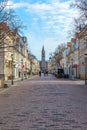 Brandenburger Street with an empty shopping arcade in Potsdam and church in distance Royalty Free Stock Photo