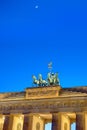 The Brandenburger Tor with a small moon Royalty Free Stock Photo