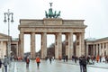 Branderburg Gate in Berlin with people around it