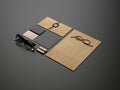 Branding elements on dark paper background