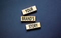 Branding and your brand story symbol. Concept words Your brands story on beautiful wooden blocks. Beautiful black table black